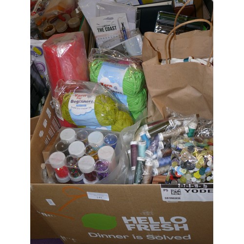 145 - A LARGE BOX OF MIXED CRAFT ITEMS INCLUDING FELT, YARN, BUTTONS, TOGGLES, RIBBONS, THREADS, STAMPS AN... 