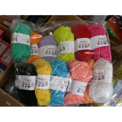 145 - A LARGE BOX OF MIXED CRAFT ITEMS INCLUDING FELT, YARN, BUTTONS, TOGGLES, RIBBONS, THREADS, STAMPS AN... 