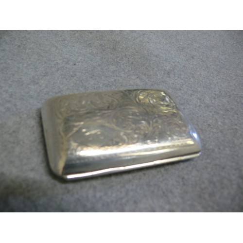 18 - Sterling Silver Cigarette Case, with engraved foliate scroll design, diamond cartouche with 