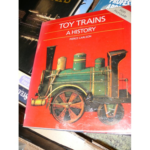 184 - TRAY CONTAINING A LARGE NUMBER OF MODEL RAILWAY BOOKS AND AGE OF STEAM VIDEOS