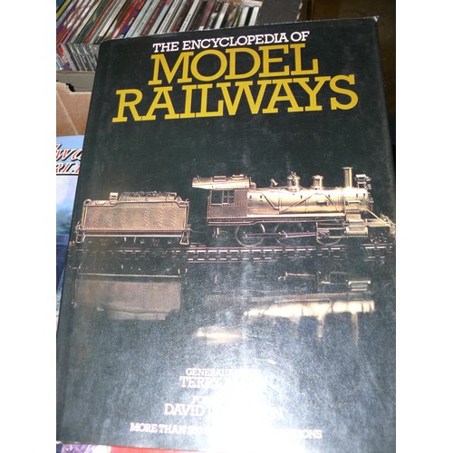 184 - TRAY CONTAINING A LARGE NUMBER OF MODEL RAILWAY BOOKS AND AGE OF STEAM VIDEOS