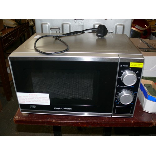 219 - A SILVER MORPHY RICHARDS 800W MICROWAVE