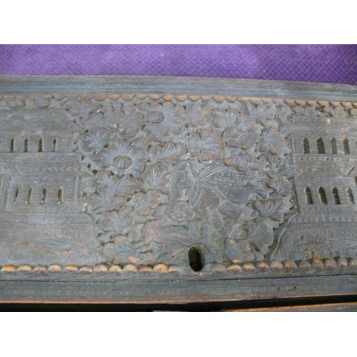 102A - A VINTAGE HEAVILY CARVED ORIENTAL WOODEN WRITING BOX WITH FITTED INTERIOR