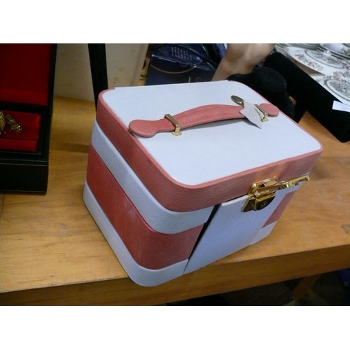 244 - A GENUINE LEATHER JEWELLERY CASE BY MELE IN PINK AND WHITE