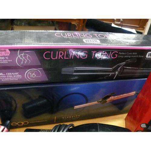 247 - A LARGE QUANTITY OF ELECTRICAL HAIR ITEMS TO INCLUDE CLIPPER SET, HAIRDRYERS, CURLING TONGS ETC