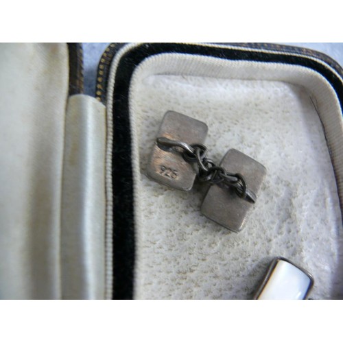 28 - A PAIR OF SILVER CUFF LINKS WITH MOTHER O PEARL ON BOTH SHOWING SIDES