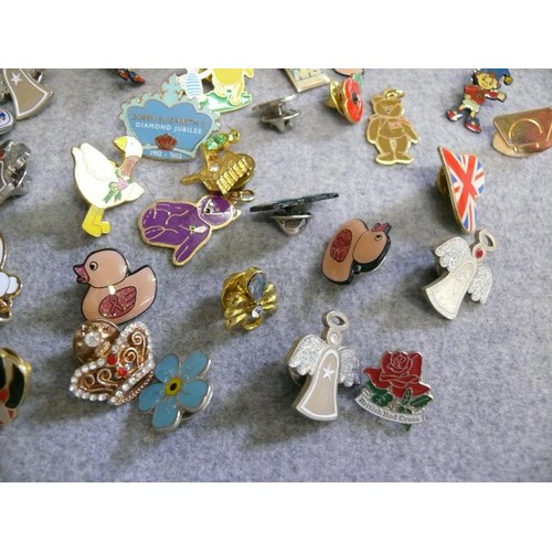 37 - A BOX OF BADGES ALL SORTS - DISNEY, RUPERT BEAR, NODDY LOTS