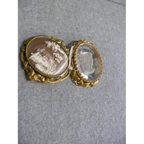 41 - TWO VINTAGE BROOCHES, ONE WITH SHELL CAMEO THE OTHER CARVED CRYSTAL IN THE ROMAN STYLE BOTH GOLD PLA... 