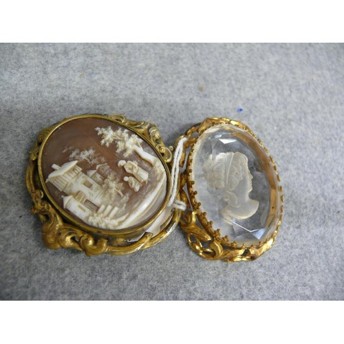 41 - TWO VINTAGE BROOCHES, ONE WITH SHELL CAMEO THE OTHER CARVED CRYSTAL IN THE ROMAN STYLE BOTH GOLD PLA... 