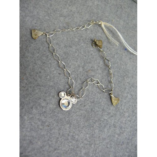 48 - A SOLID SILVER DISNEY CHARM BRACELET