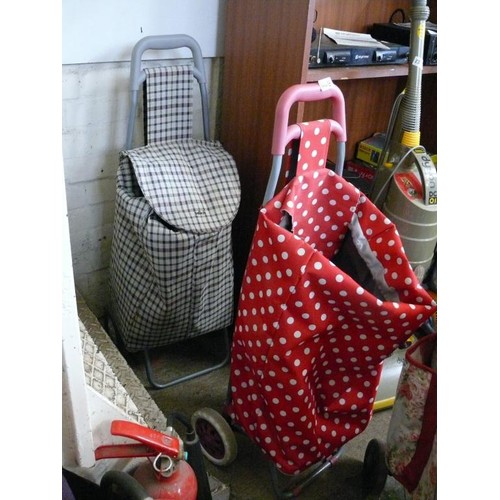 144B - 2 GOOD QUALITY SHOPPING TROLLEYS 1 RED POLKA DOT AND 1 BROWN CHECK