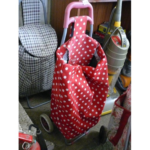 144B - 2 GOOD QUALITY SHOPPING TROLLEYS 1 RED POLKA DOT AND 1 BROWN CHECK