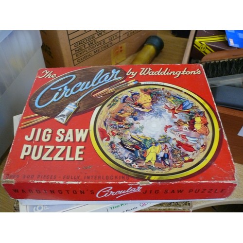 402 - BOX OF JIGSAWS