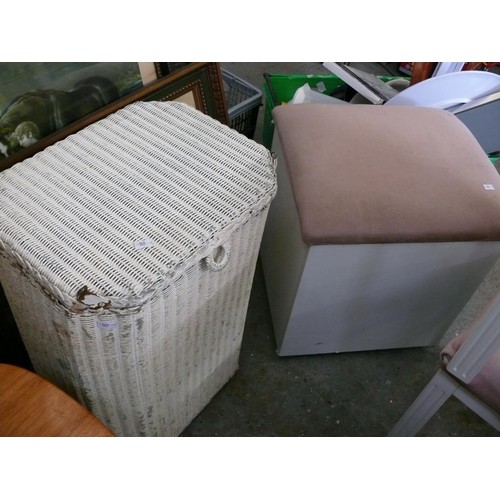 356 - A WOODEN STORAGE STOOL WITH PINK UPHOLSTERED SEAT TOP AND A WICKER LAUNDRY BASKET