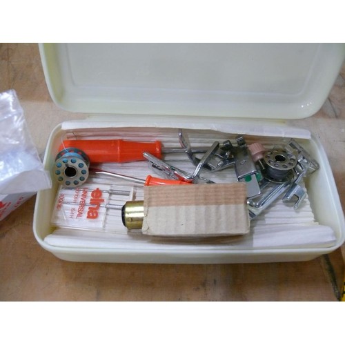 243 - A SINGER SEWING MACHINE BOX OF PARTS PLUS A PAIR OF BATTERY OPERATED SCISSORS AND A 4