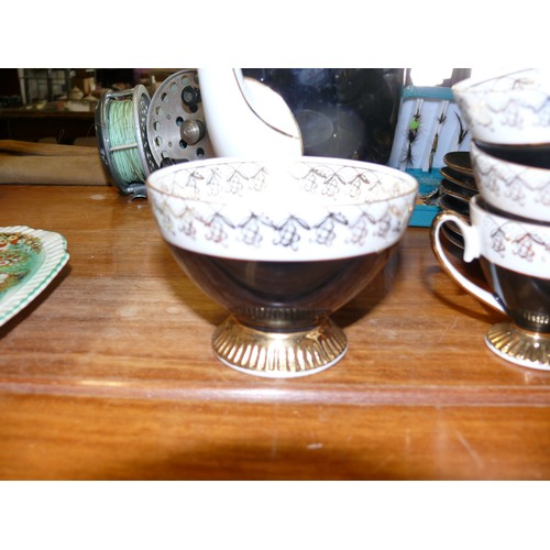 164 - A BEAUTIFUL BLACK, WHITE AND GOLD VINTAGE CHINA COFFEE SET