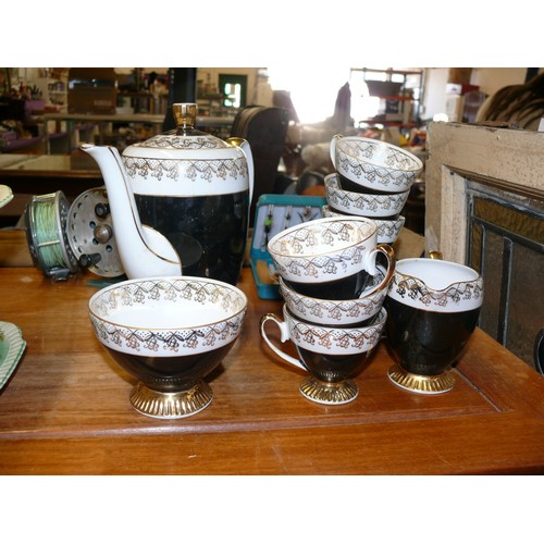 164 - A BEAUTIFUL BLACK, WHITE AND GOLD VINTAGE CHINA COFFEE SET