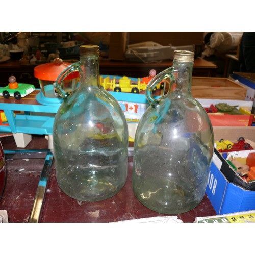 216 - A PAIR OF LARGE VINTAGE GLASS BOTTLES