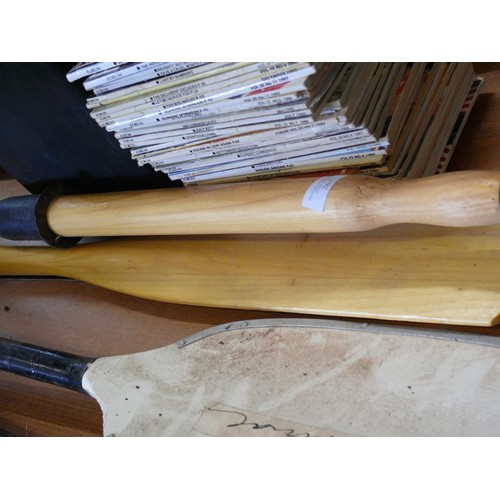 262 - A PAIR OF ROWING BOAT OARS, A PAIR OF DINGHY PADDLES AND A CANOE PADDLE