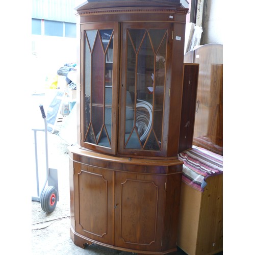 390 - A TALL DOUBLE GLASS DOOR CORNER CABINET