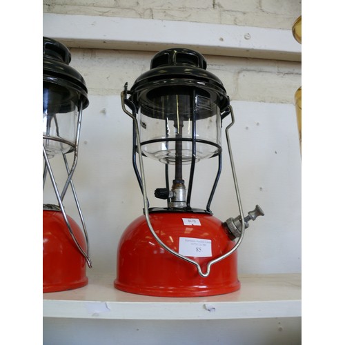 85 - A VINTAGE TILLEY LAMP WITH RED BASE