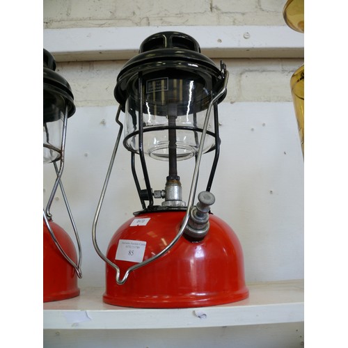 85 - A VINTAGE TILLEY LAMP WITH RED BASE