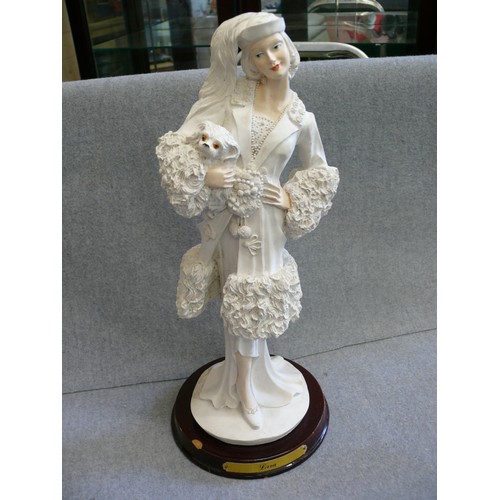 61 - 2 LARGE DECORATIVE FIGURINES OF LADIES WITH DOGS