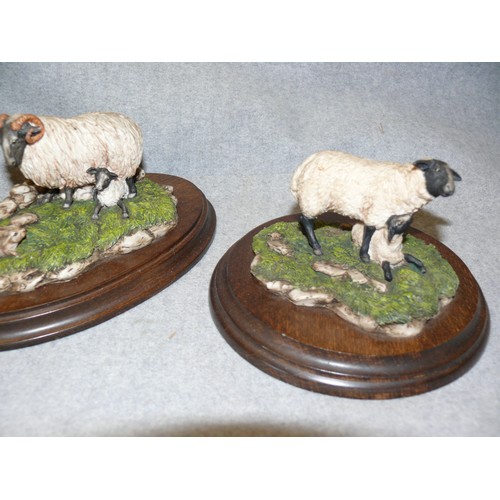 98 - A PAIR OF COUNTRY ARTISTS SHEEP FIGURINES PLUS A FISHERMAN WITH A DOG