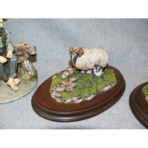 98 - A PAIR OF COUNTRY ARTISTS SHEEP FIGURINES PLUS A FISHERMAN WITH A DOG