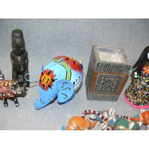 127 - A COLLECTION OF DECORATIVE ITEMS TO INCLUDE METAL ELEPHANT, EGYPTIAN HEAD, WOODEN TRIBAL ITEMS ETC