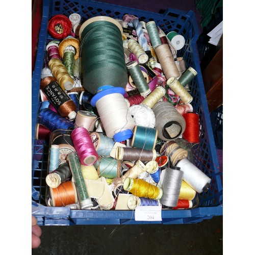 204 - A BASKET OF VARIOUS REELS OF COTTON