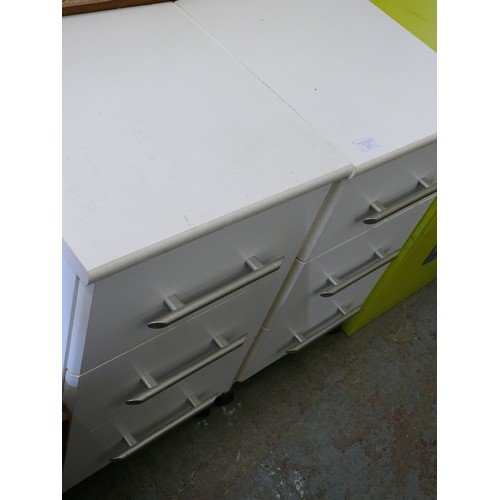 277 - A PAIR OF WHITE 3 DRAWER BEDSIDES