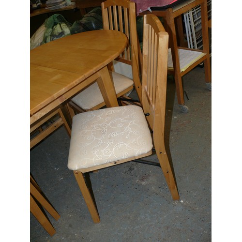 254 - AN EXTENDING BEECH DINING TABLE WITH 4 MATCHING UNUSUAL FOLDING CHAIRS