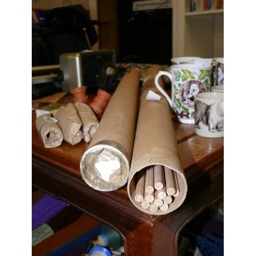 188 - 2 TUBES OF LONG WOODEN DOWELS