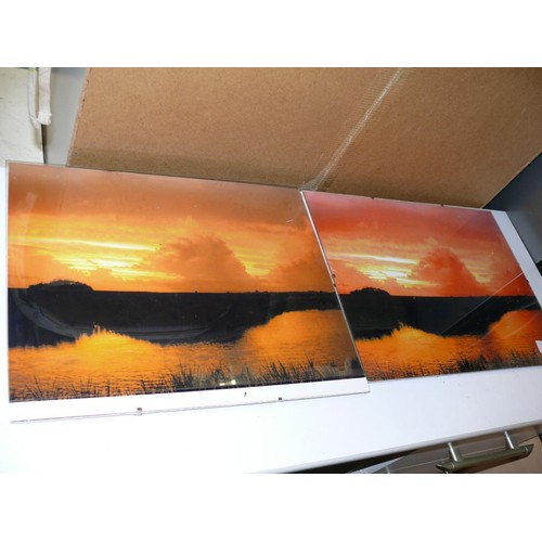 293 - A PAIR OF PHOTOS OF SUNSET