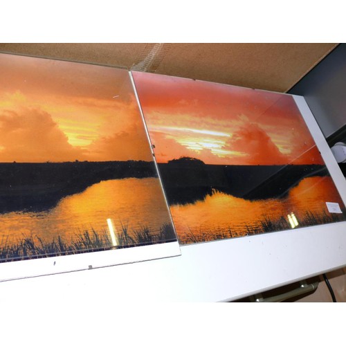 293 - A PAIR OF PHOTOS OF SUNSET