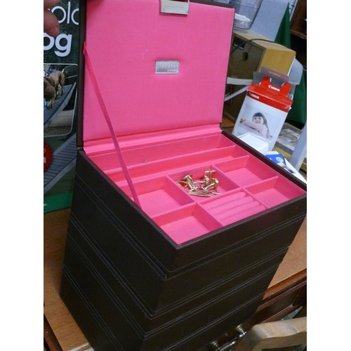 329 - A SET OF STACKERS JEWELLERY BOXES WITH A SMALL AMOUNT OF JEWELLERY