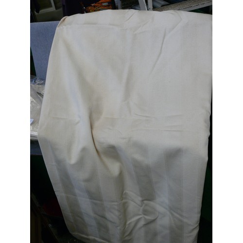 334 - A PAIR OF CREAM 100% COTTON LINED CURTAINS