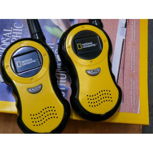 342 - A PAIR OF NATIONAL GEOGRAPHIC WALKIE TALKIES PLUS A SELECTION OF MAGAZINES