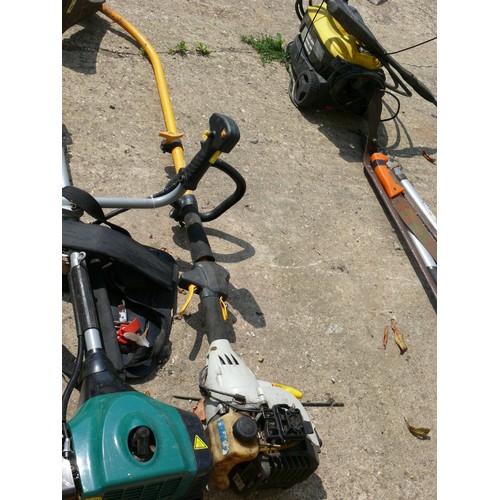 409 - RYOBI AND 1 OTHER PETROL STRIMMERS