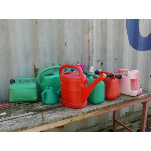 401 - QUANTITY OF WATERING CANS AND A FUEL CAN