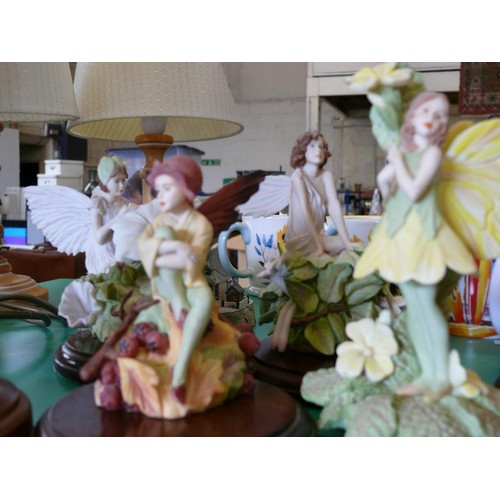 374 - A COLLECTION OF 'THE FLOWER FAIRY' ORNAMENTS BY DANBURY MINT