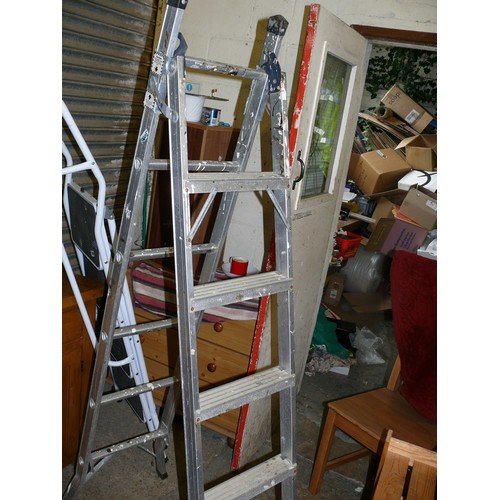 309B - 5 STEP LADDER EXTENDS INTO A LONG LADDER