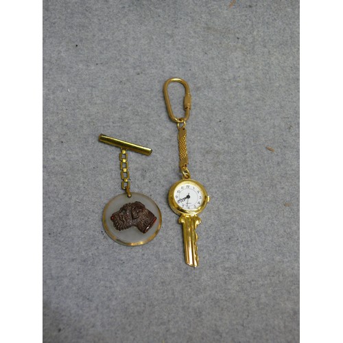 58 - WATCH KEY AND BROOCH WITH TERRIER DESIGN