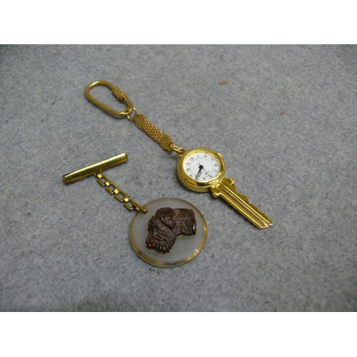 58 - WATCH KEY AND BROOCH WITH TERRIER DESIGN