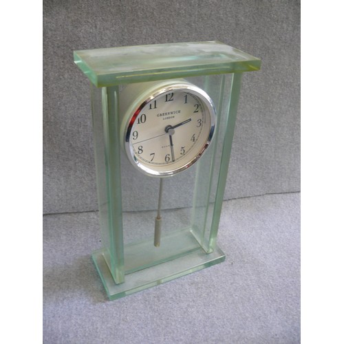 102 - A VERY HEAVY GREEN GLASS MANTLE CLOCK BY GREENWICH, LONDON