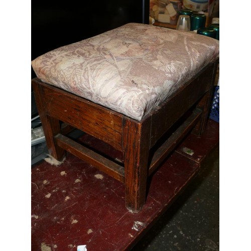 223 - A VINTAGE WOODEN FOOT STOOL WITH UPHOLSTERED SEAT PAD