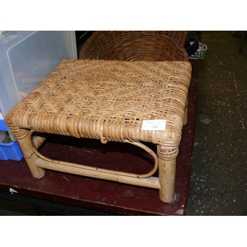 246 - A SMALL WOVEN WICKER FOOTSTOOL