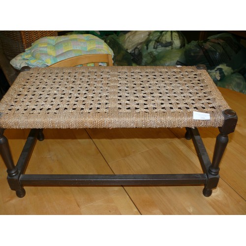 266 - A LARGE WOVEN WICKER STOOL