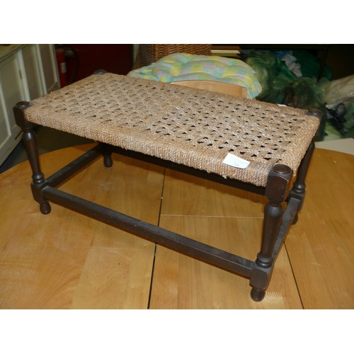 266 - A LARGE WOVEN WICKER STOOL